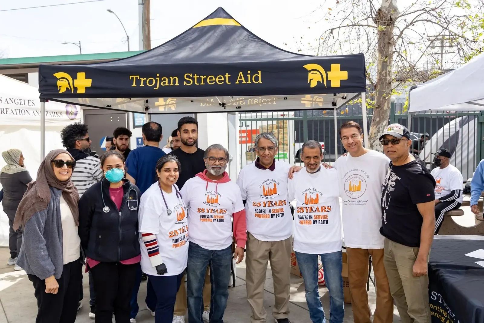Talha Rafique with volunteer physicians at the TSA tent